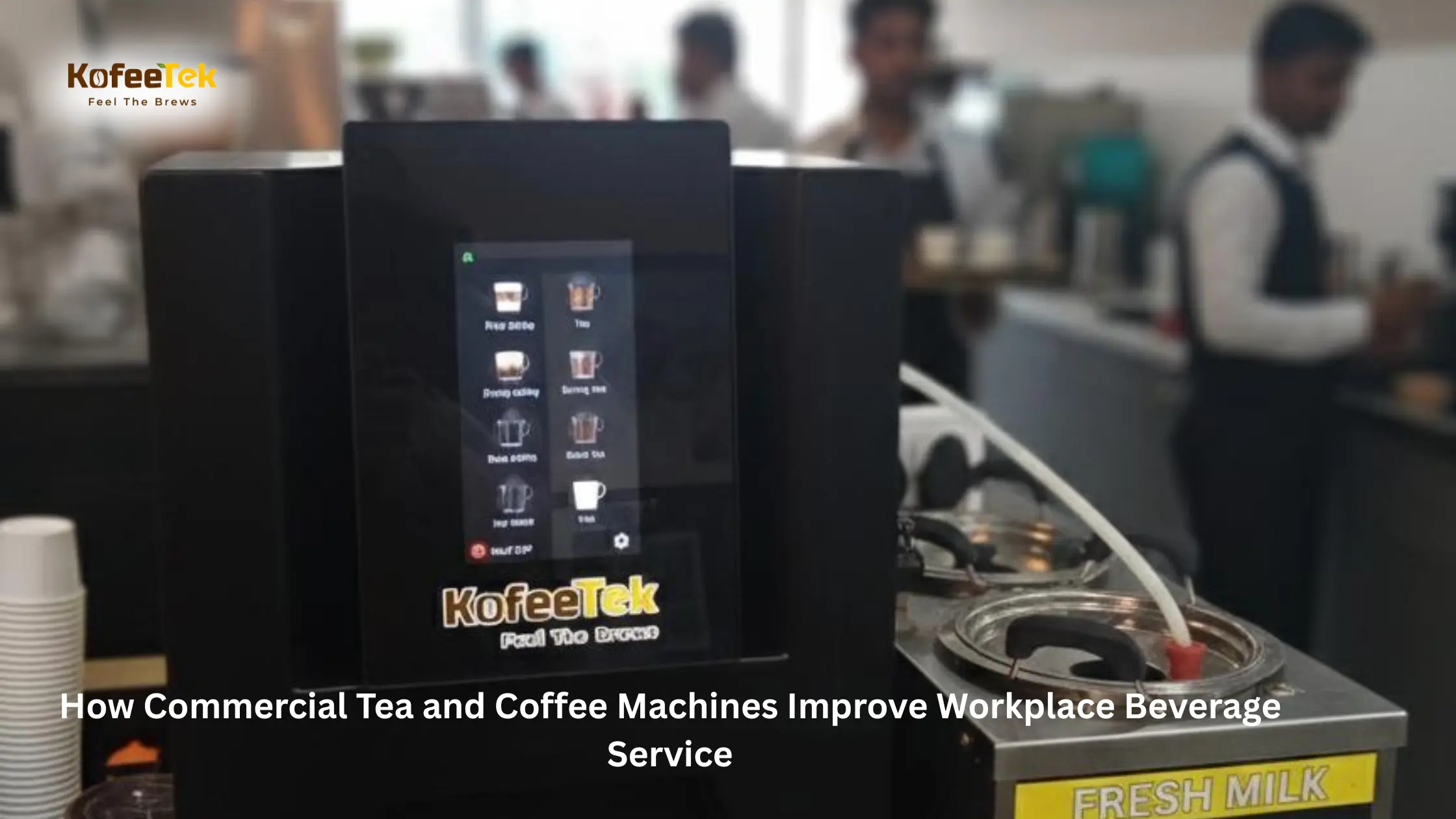 KofeeTek commercial tea and coffee vending machine with touchscreen beverage menu and fresh milk unit in a workplace setting